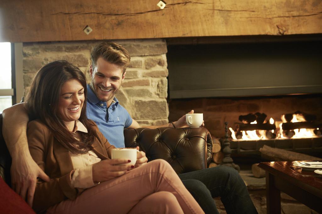 The Celtic Manor Resort Newport Kültér fotó A couple drinking coffee