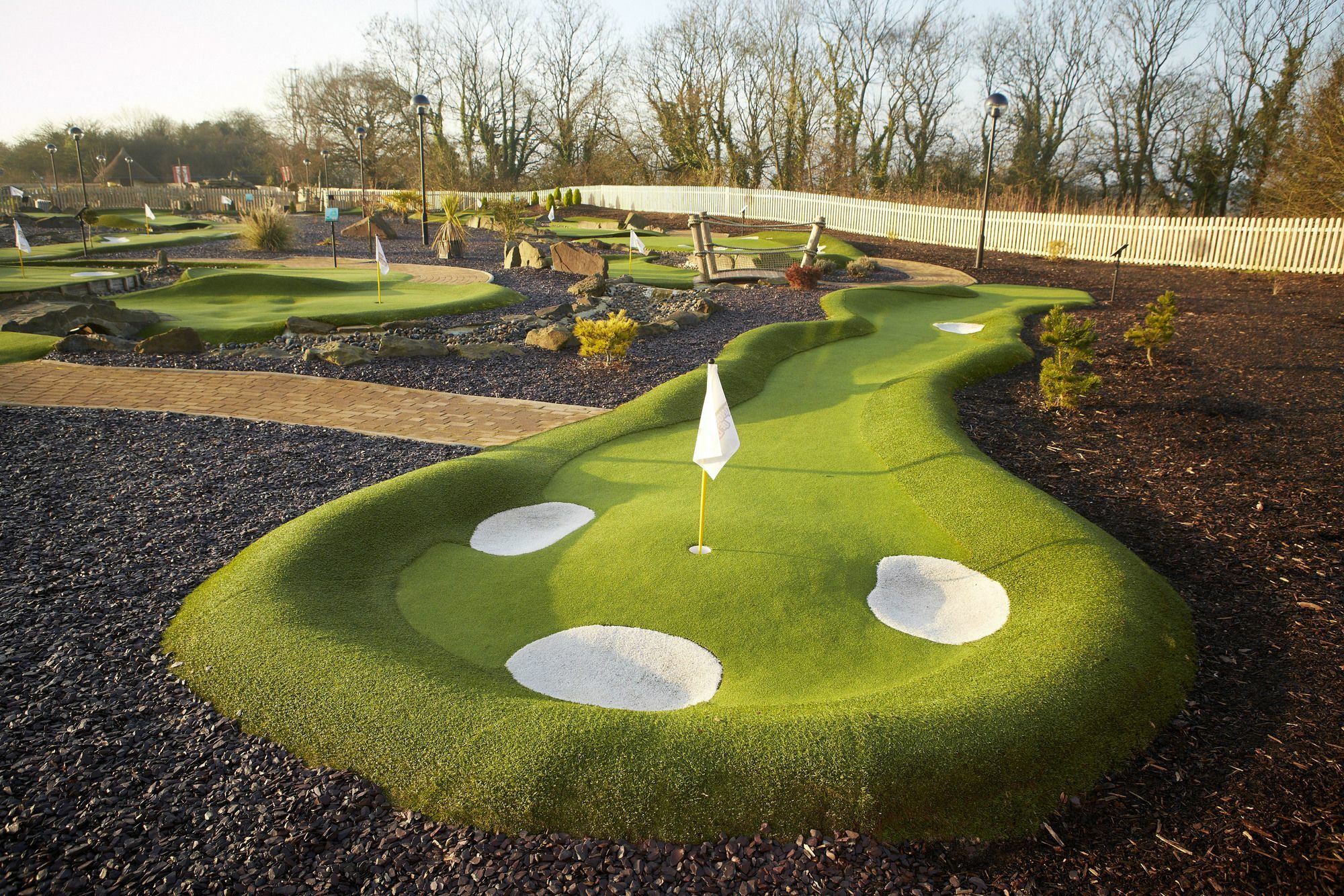 The Celtic Manor Resort Newport Kültér fotó A putting green at a golf course